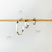 Load image into Gallery viewer, Huggie Flat Classic Hoops
